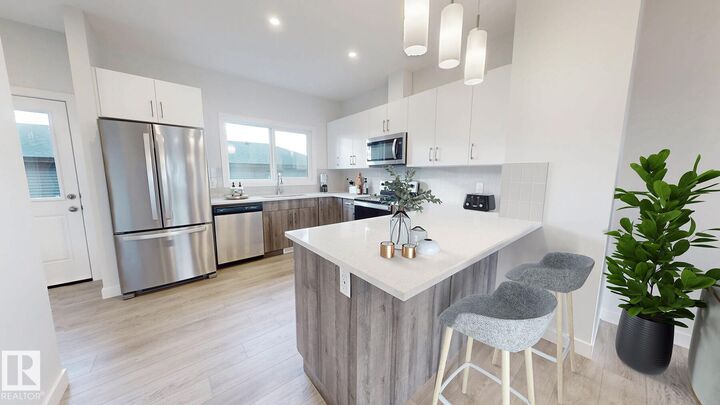 Property Photo:  691 Cambrian Boulevard  AB T8H 3B7 