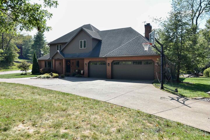 Property Photo:  8840 McCutchan Place  IN 47725 