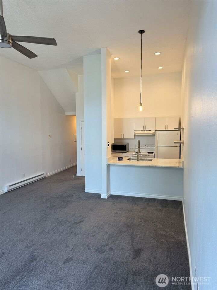 Property Photo:  2939  76th Avenue SE 42A  WA 98040 
