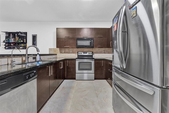Property Photo:  9770 NW 10th St  FL 33172 