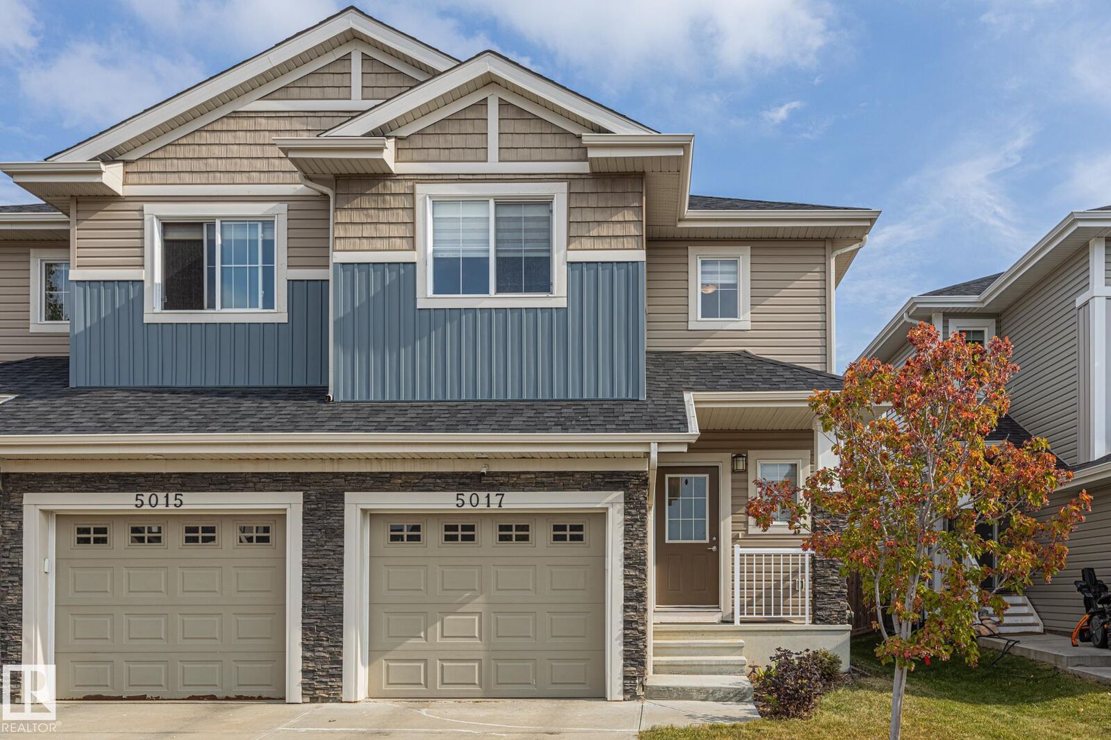 Property Photo: 5017 Andison Close SW AB T6W 3T3