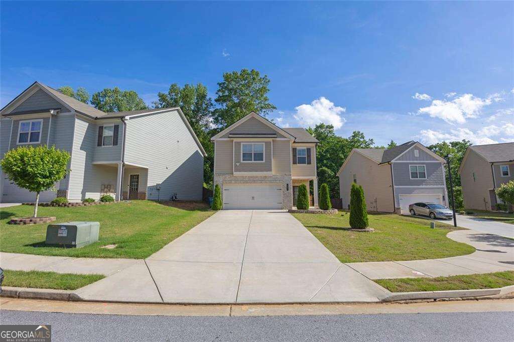 Property Photo:  104 Auburn Crossing Way  GA 30011 