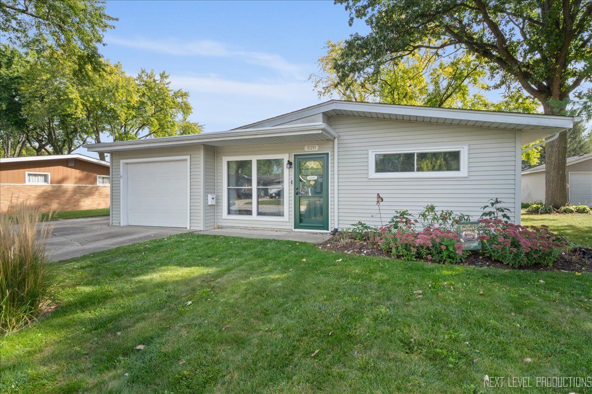 Property Photo: 320 Harmony Drive IL 60542