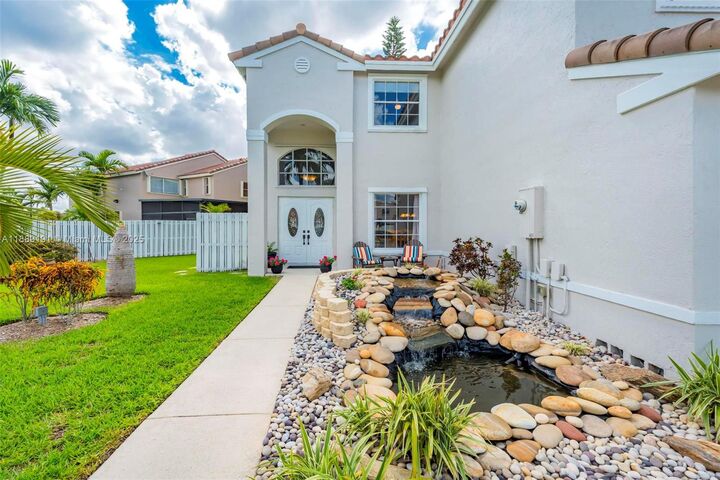 Property Photo: 1061 NW 190th Ave FL 33029