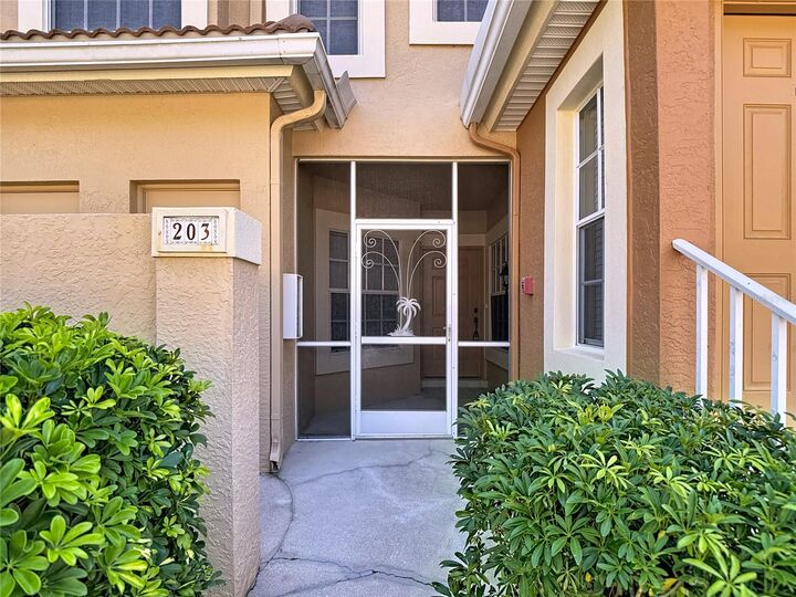 Property Photo: 13010 Amberley Court 203 FL 34135