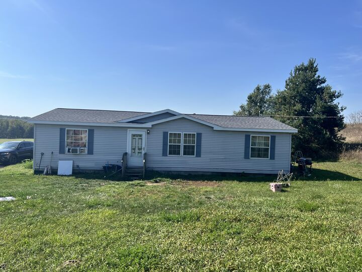Property Photo: 4897 S 64th Avenue MI 49446