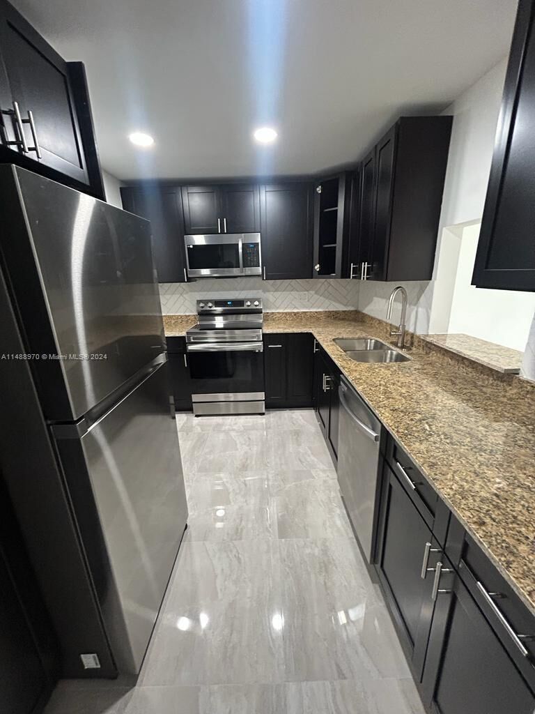 Property Photo: 4314 NW 9th Avenue 4-3A FL 33064