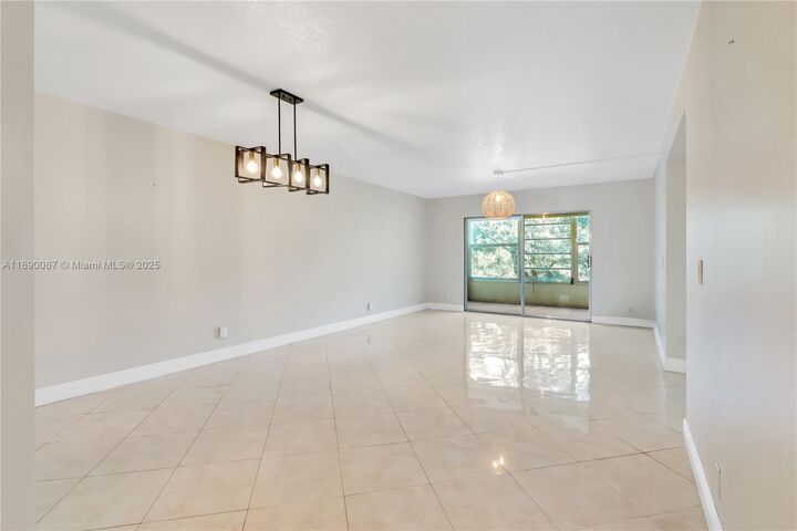 Property Photo:  900 SW 125th Way 304R  FL 33027 