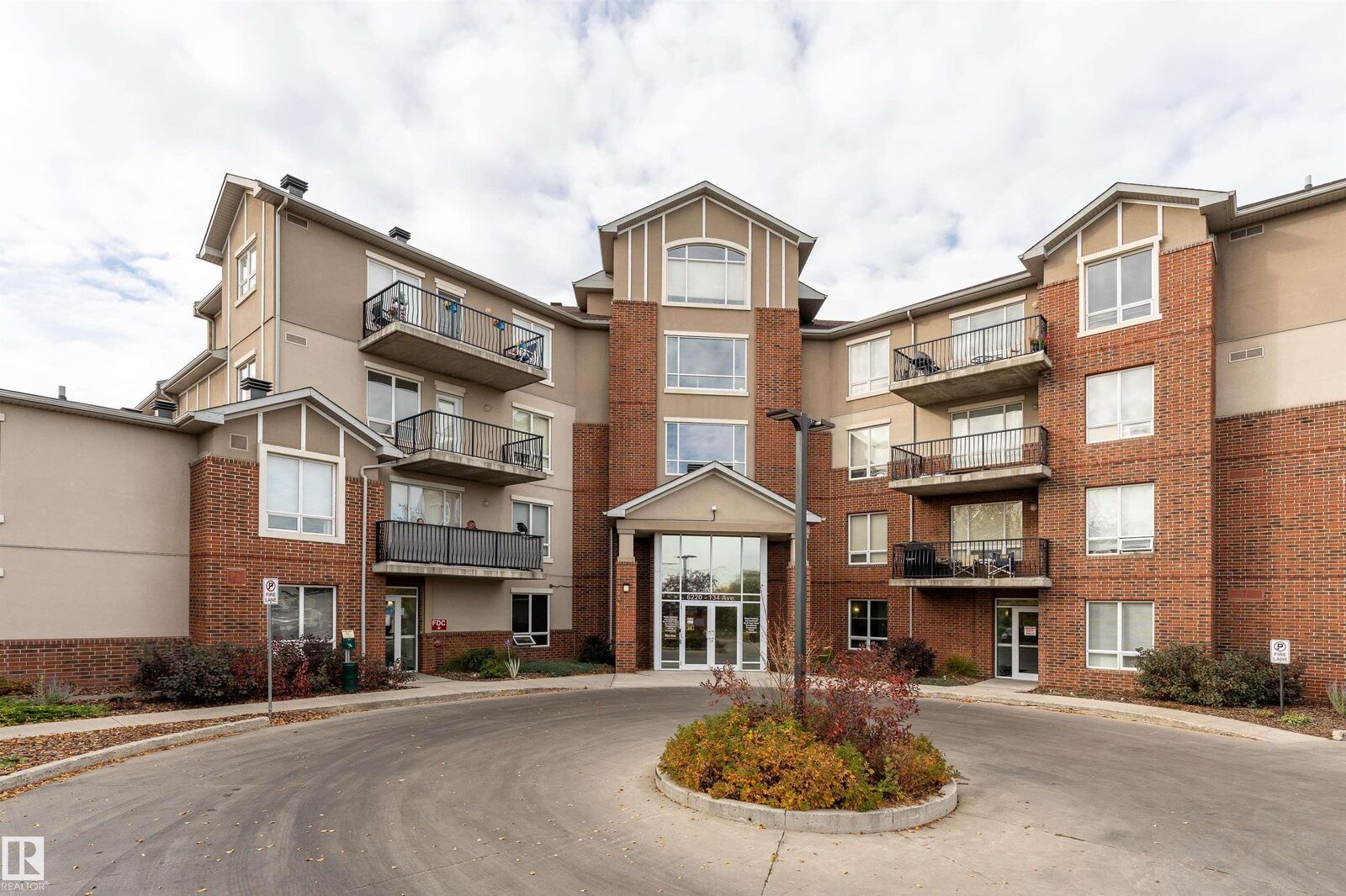 Property Photo: 6220 134 Avenue NW 101 AB T5A 0A8