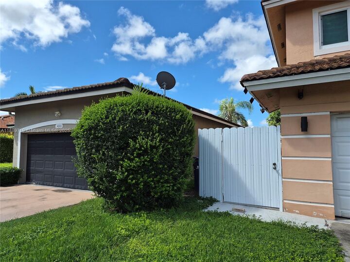 Property Photo:  14300 SW 161st Pl 1  FL 33196 