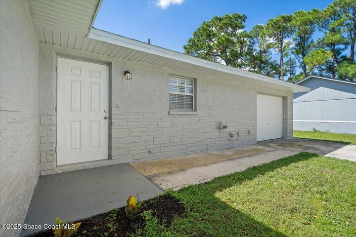 Property Photo: 680 Bluefields Street SE FL 32909