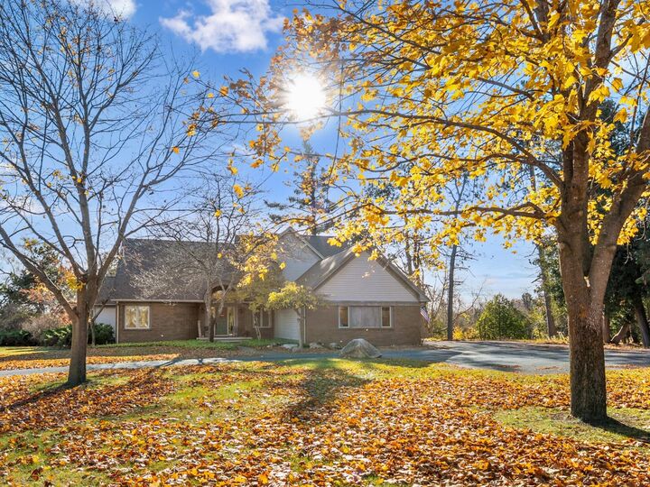 Property Photo: 212 Long Rapids Road MI 49707