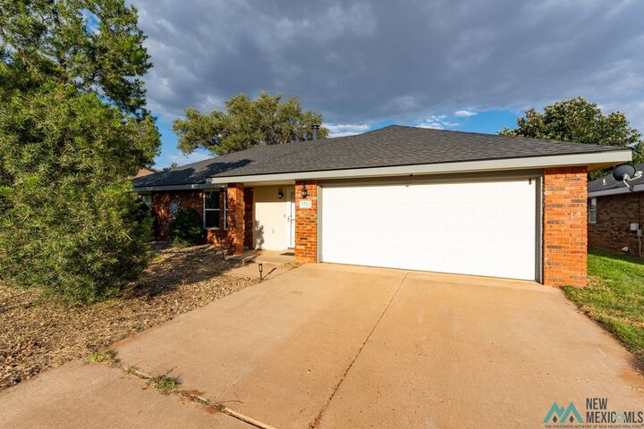 Property Photo: 1721 Erinn Place NM 88101
