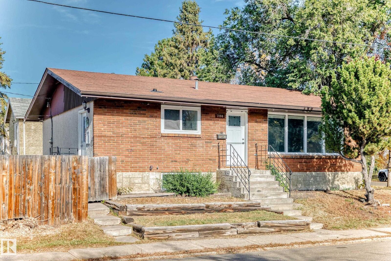 Property Photo: 7104 129 Avenue NW AB T5C 1W1