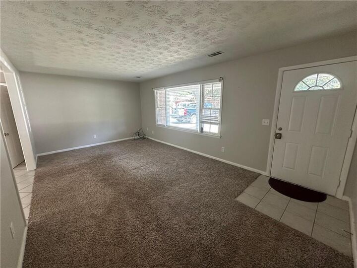 Property Photo:  727 S Carter Drive  GA 30236 