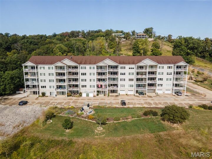 Property Photo:  401 Timber Ridge Drive 24  IL 62037 
