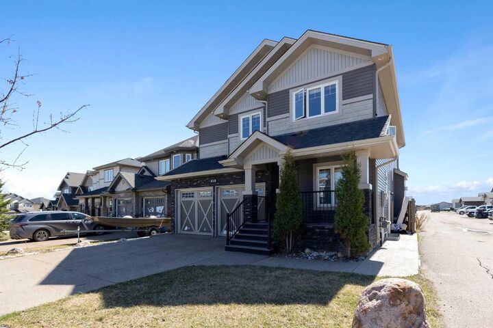 Property Photo: 619 Heritage Drive AB T9K 2X1