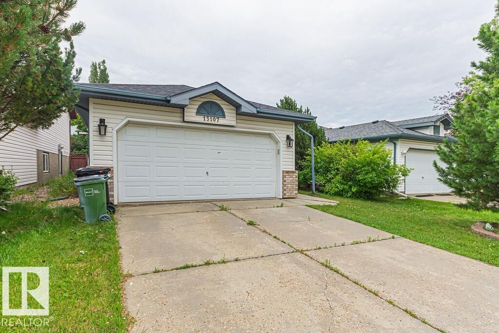 Property Photo: 13107 36 Street NW AB T5A 5C7