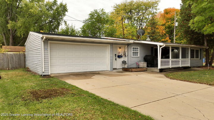 Property Photo:  833 Dornell Avenue  MI 48910