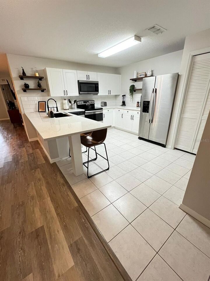 Property Photo: 8837 Grand Palms Circle A FL 34747