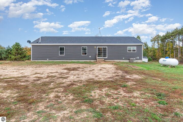 Property Photo:  8770 N Vickeryville Road  MI 48891 