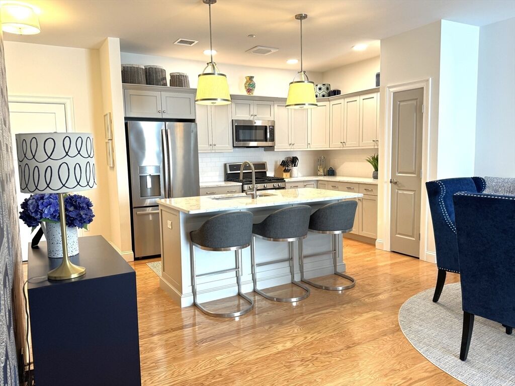 Property Photo:  1 Revolution Way 307  MA 02021
