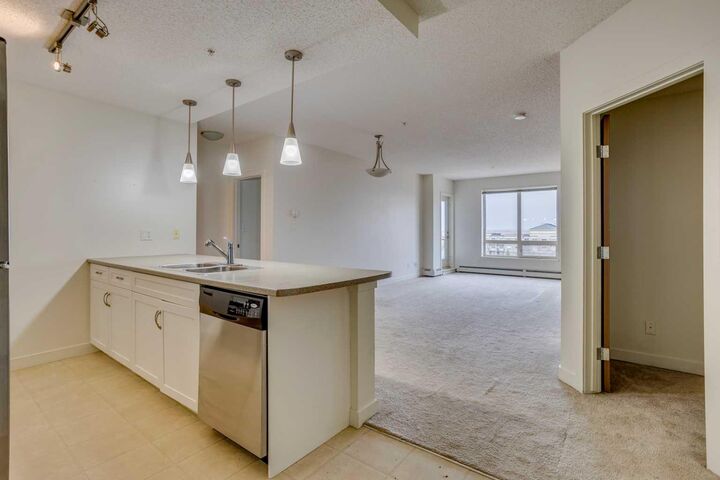 Property Photo: 136D Sandpiper Road 503 AB T9K 0J7