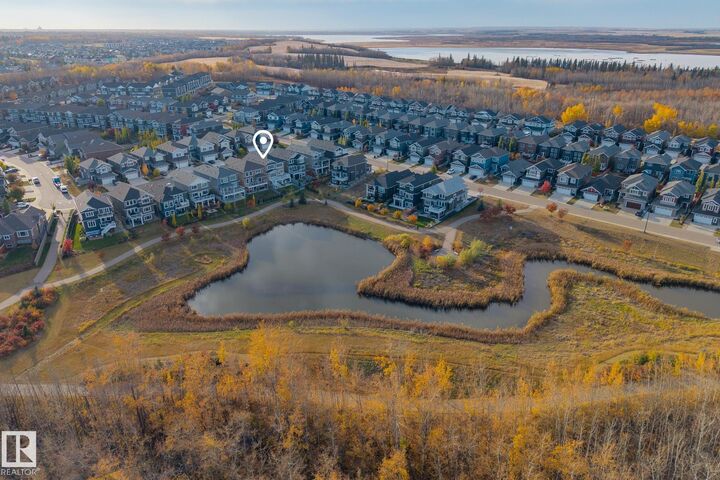 Property Photo: 3419 Chickadee Drive NW AB T5A 0L1