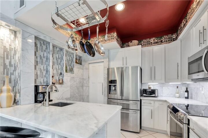 Property Photo: 15063 Sterling Oaks Dr FL 34110