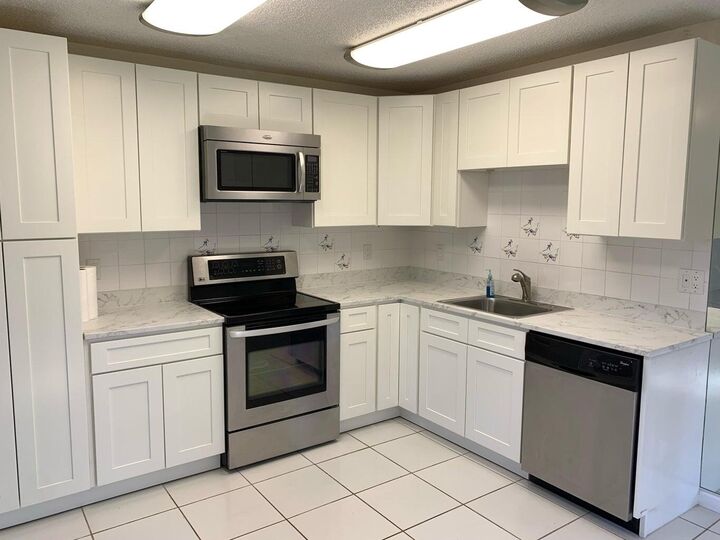 Property Photo: 4958 Alder Drive A FL 33417