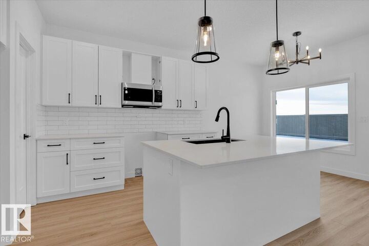Property Photo: 219 Ravine Drive AB T9G 0M2