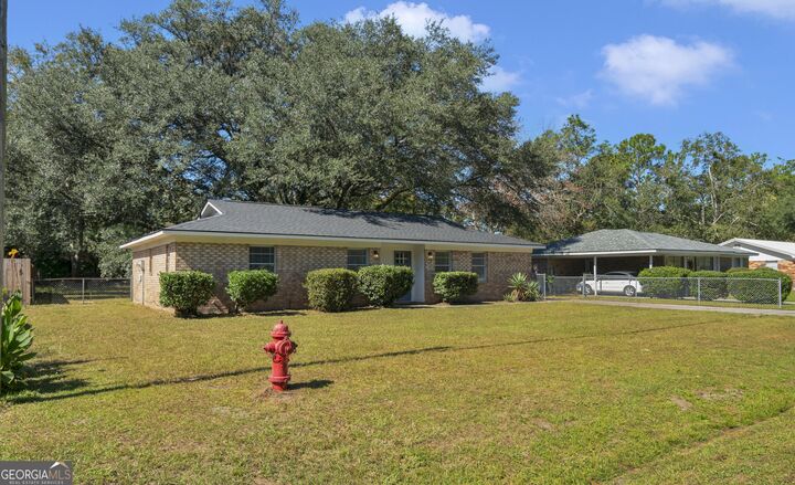 Property Photo:  927 Charles C Frasier Boulevard  GA 31313