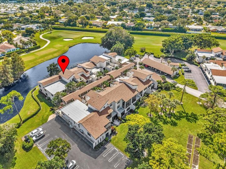 Property Photo:  900 Greensward Lane 103-G  FL 33445 