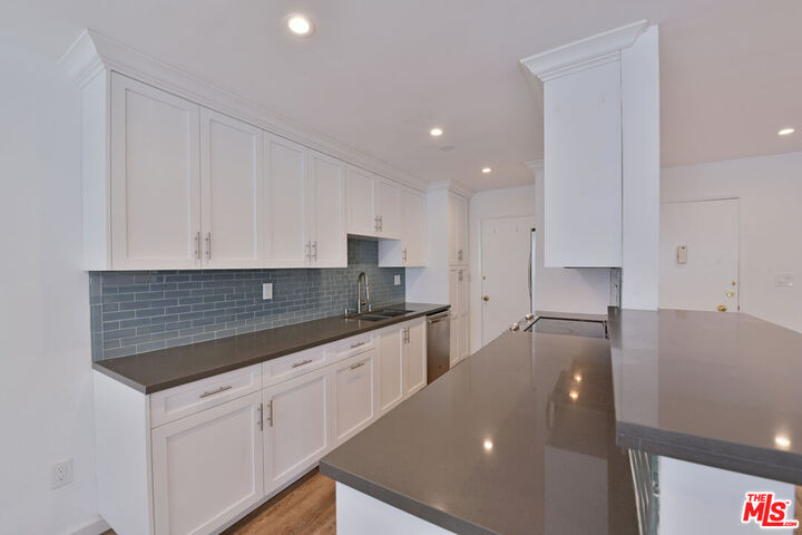 Property Photo:  136 S Palm Dr  CA 90212