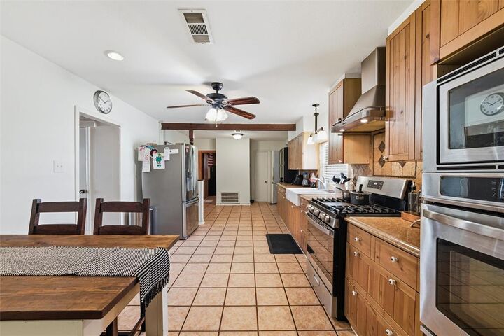 Property Photo:  518 Red Bud Lane  TX 75211 
