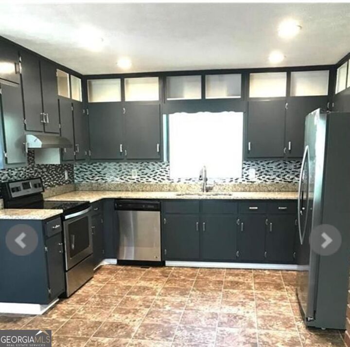 Property Photo: 6744 Rockbridge Road GA 30087