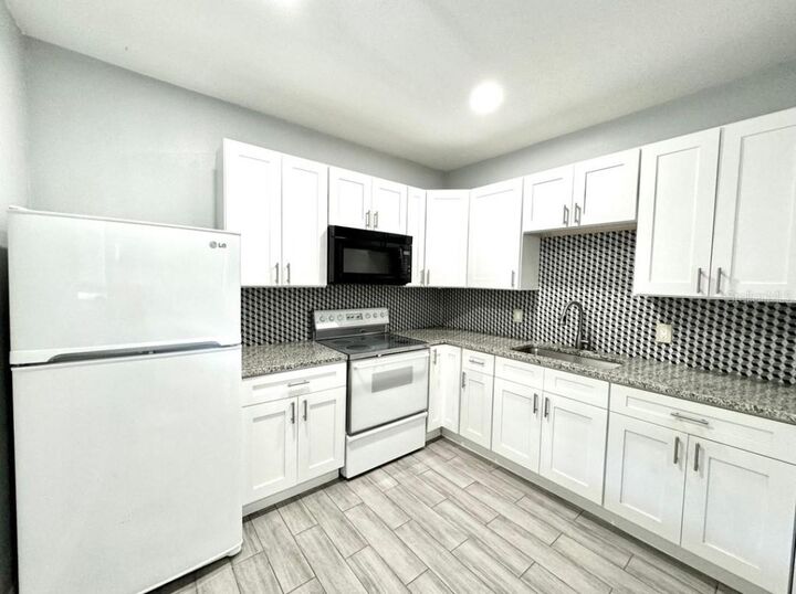 Property Photo:  1411 E 24th Avenue B  FL 33605 