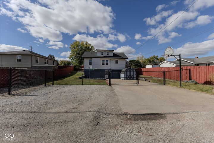 Property Photo:  459 S Holt Road  IN 46241