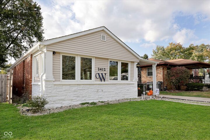 Property Photo:  2412 Harlan Street  IN 46203
