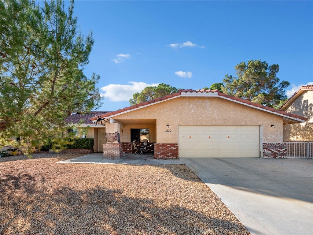 Property Photo:  14759 Blue Grass  CA 92342 