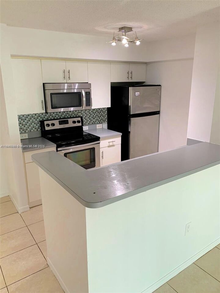 Property Photo:  620 SW 111th Ave 104  FL 33025