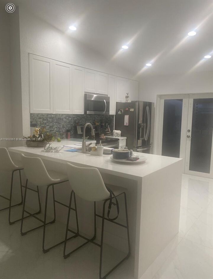 Property Photo:  7539 NW 173rd Ter  FL 33015