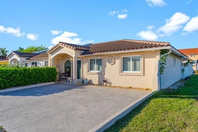 Property Photo: 7539 NW 173rd Ter FL 33015