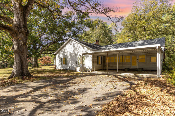 Property Photo:  5033 Theys Road  NC 27606 