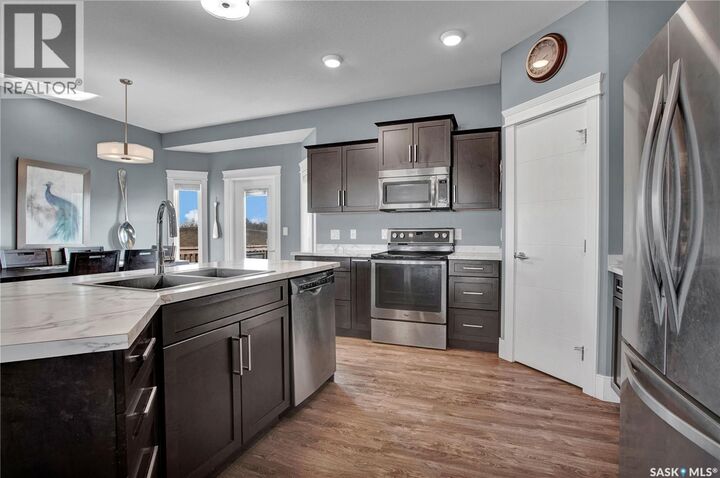 Property Photo:  230 Baycroft Drive  SK S0K 2T2