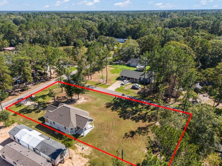 Property Photo:  138 County Road 3314  TX 77327 