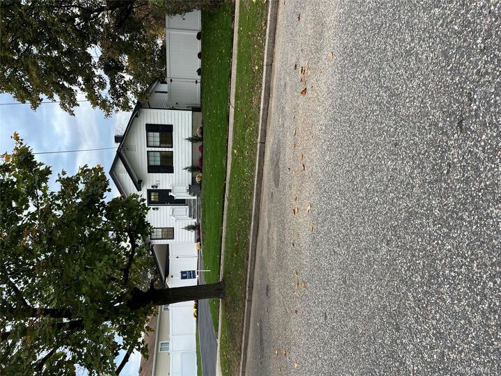 Property Photo:  53 E Elm Street  NY 11722 