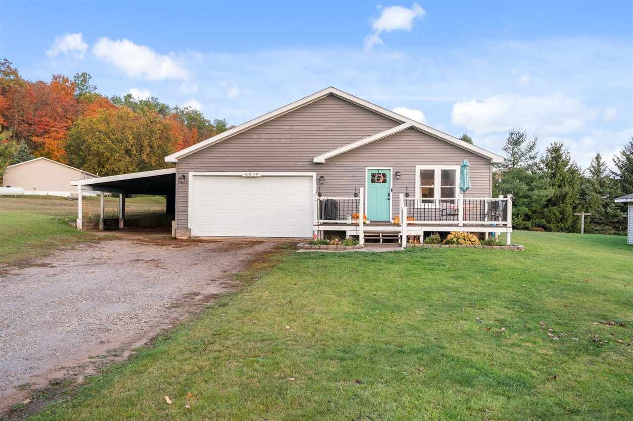 Property Photo:  5829 Springvale  MI 49713