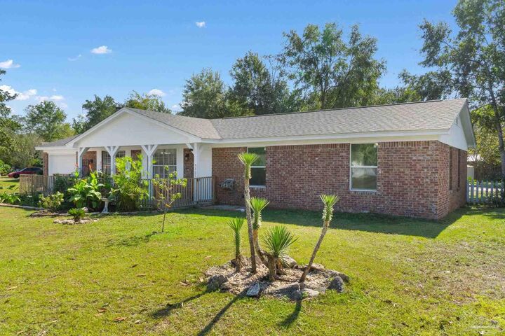 Property Photo:  5301 E Avenida De Golf  FL 32571