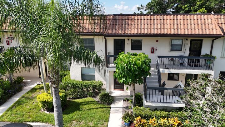 Property Photo: 7214 Golf Colony Court 205 FL 33467